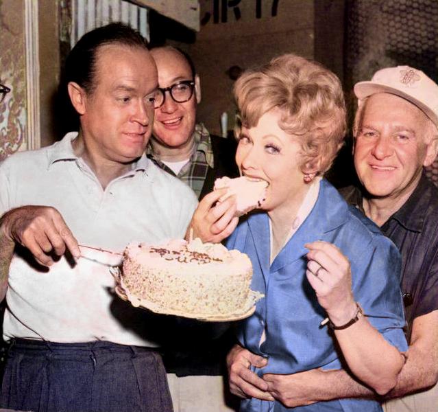 colorized photo of a lady eating the cake