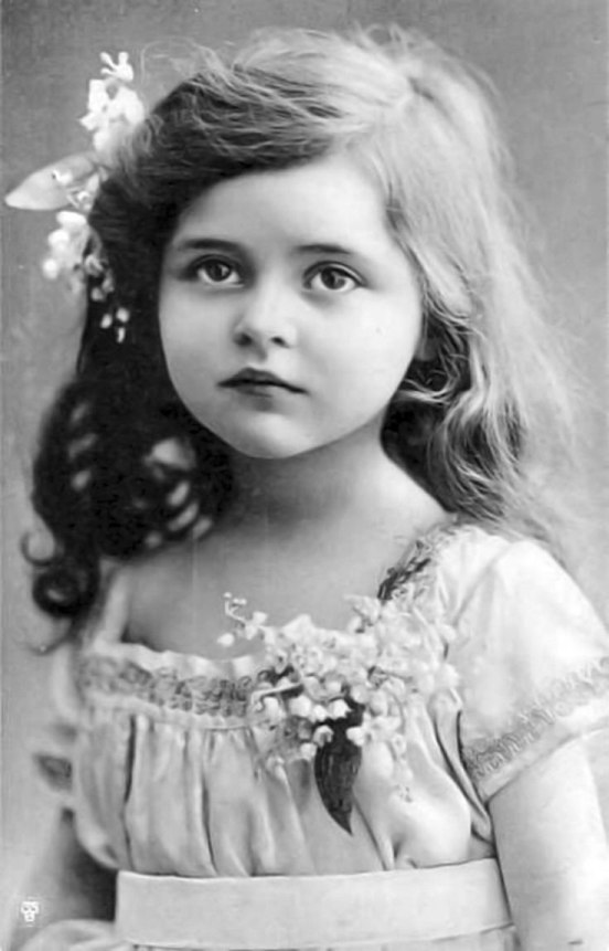 black and white photo of a small girl